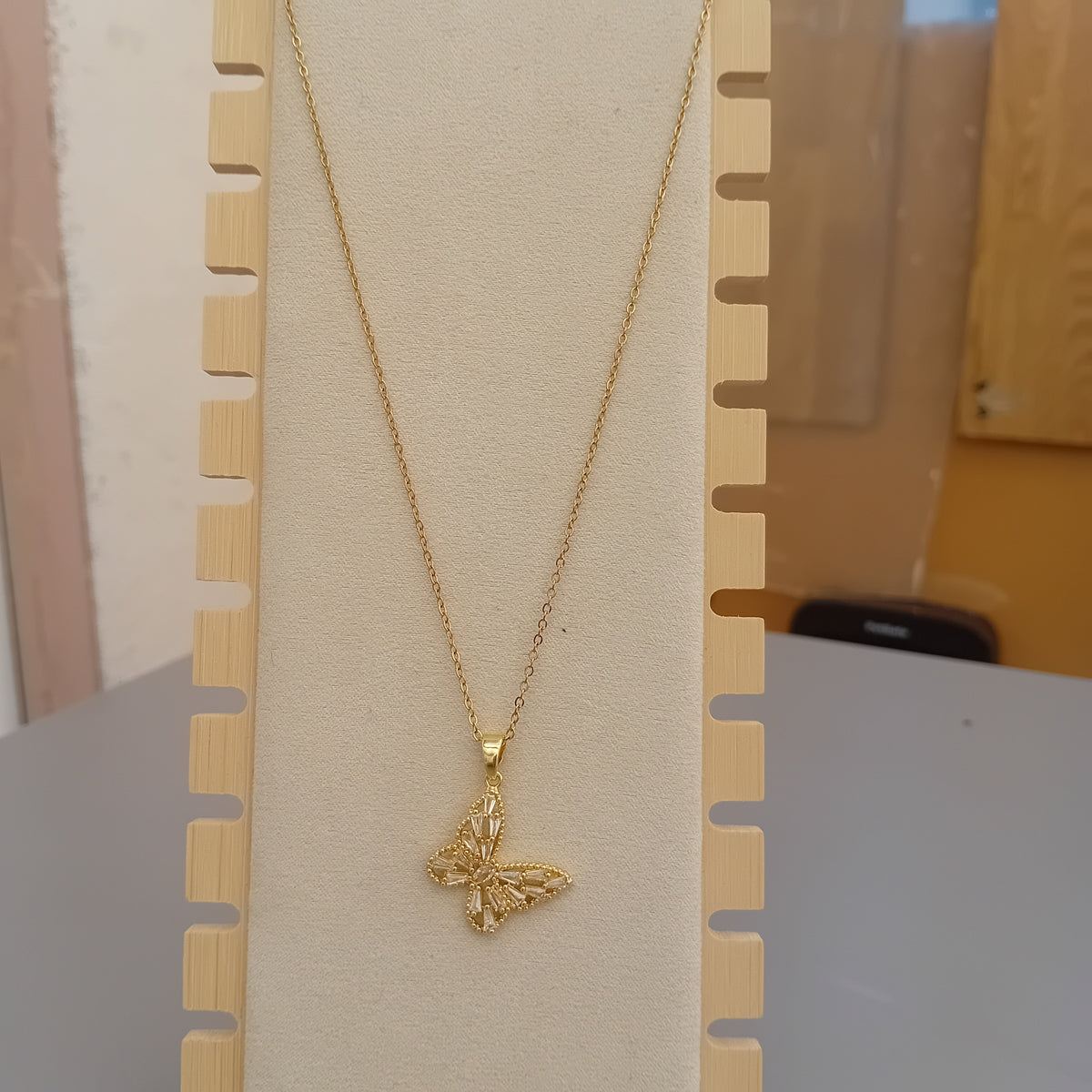 collier pendentif papillon