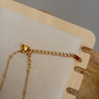 Collier motif cerise avec strass en acier inoxydable
