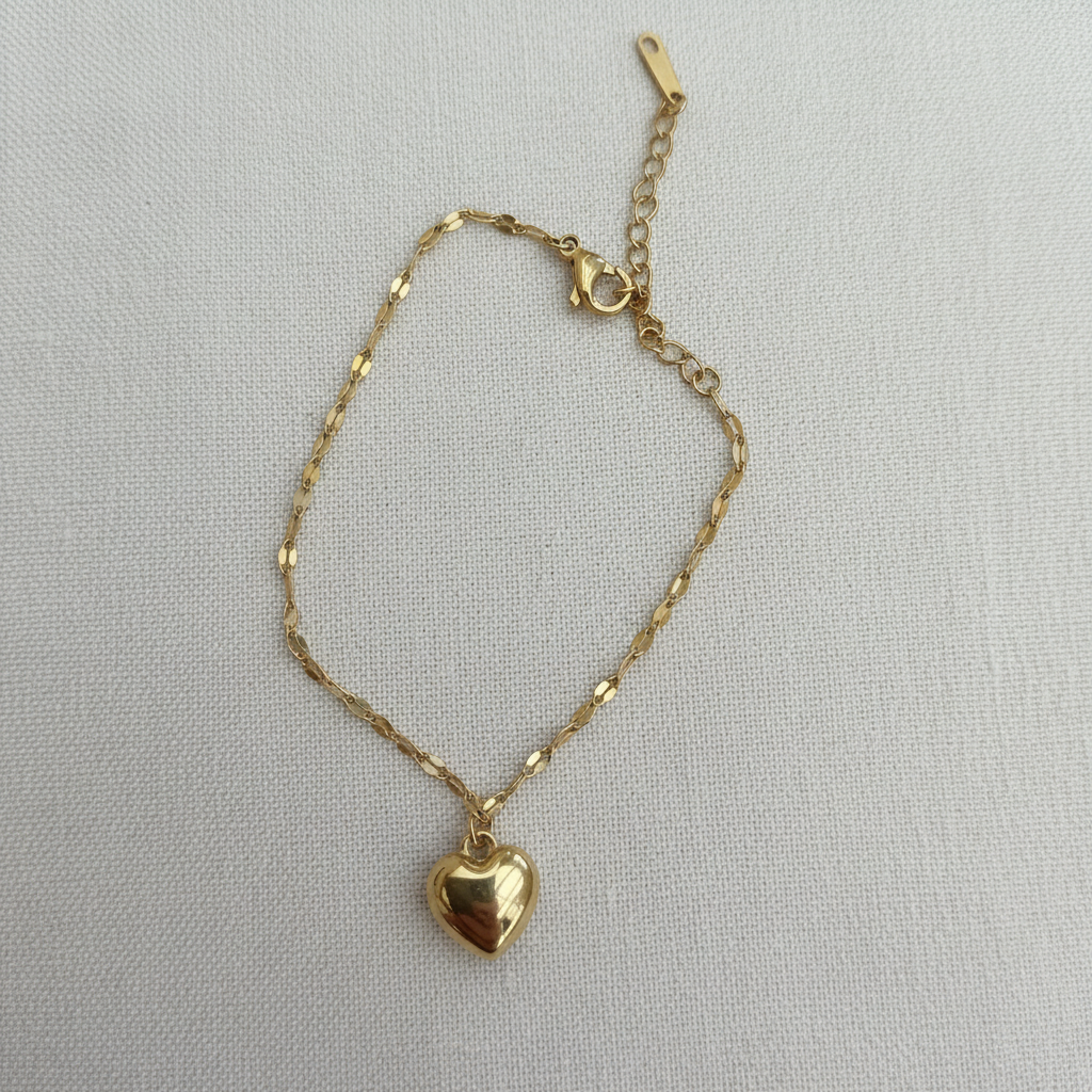 Bracelet cœur doré - fond lin crème