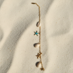 Bracelet coquillages - même forme, fond sable